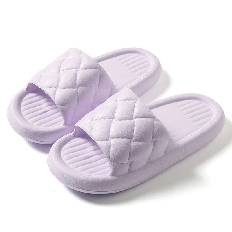 Comfortable and lightweight home slippers with a unique rhombus pattern, waterproof and odor-resistant EVA material, and a non-slip sole for safe indoor wear.