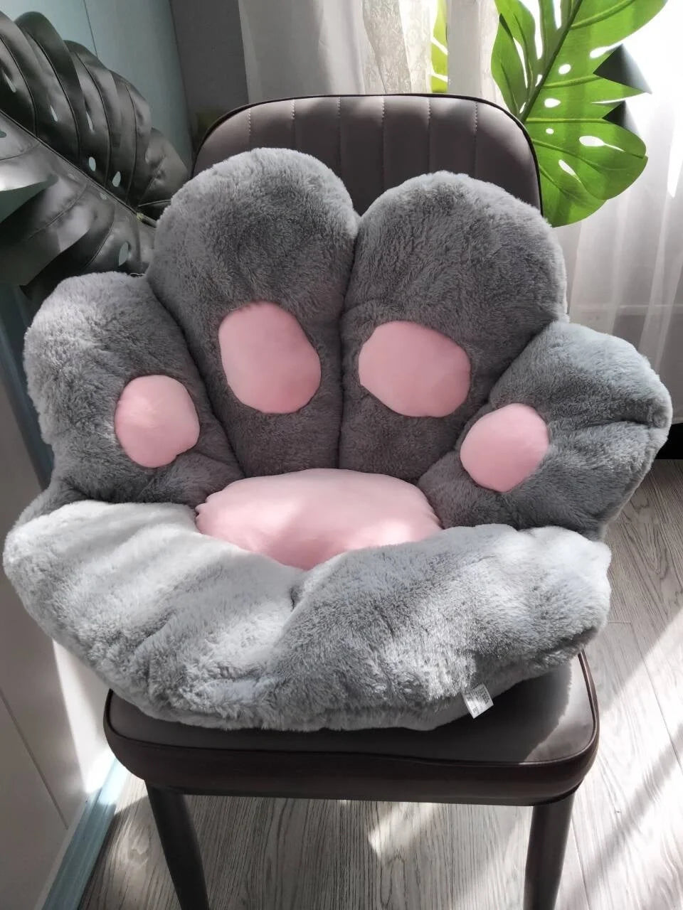 Plush office chair cushion with adorable paw-shaped design in various colors and sizes