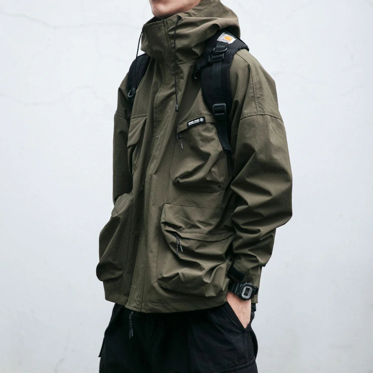 Men's hooded jacket in black, yellow, or green with windproof feature and three-dimensional pockets