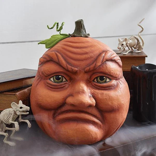 A collection of hand-crafted pumpkin decorations in various sizes, perfect for adding an enchanting touch to your Halloween celebrations.