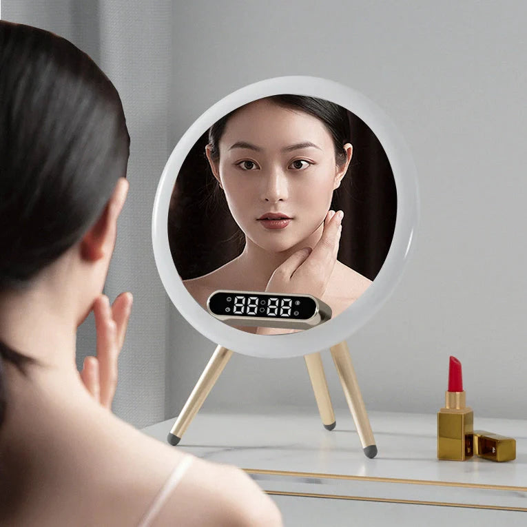 Multi-function LED mirror alarm clock with wireless charging and Bluetooth speaker in blue and white