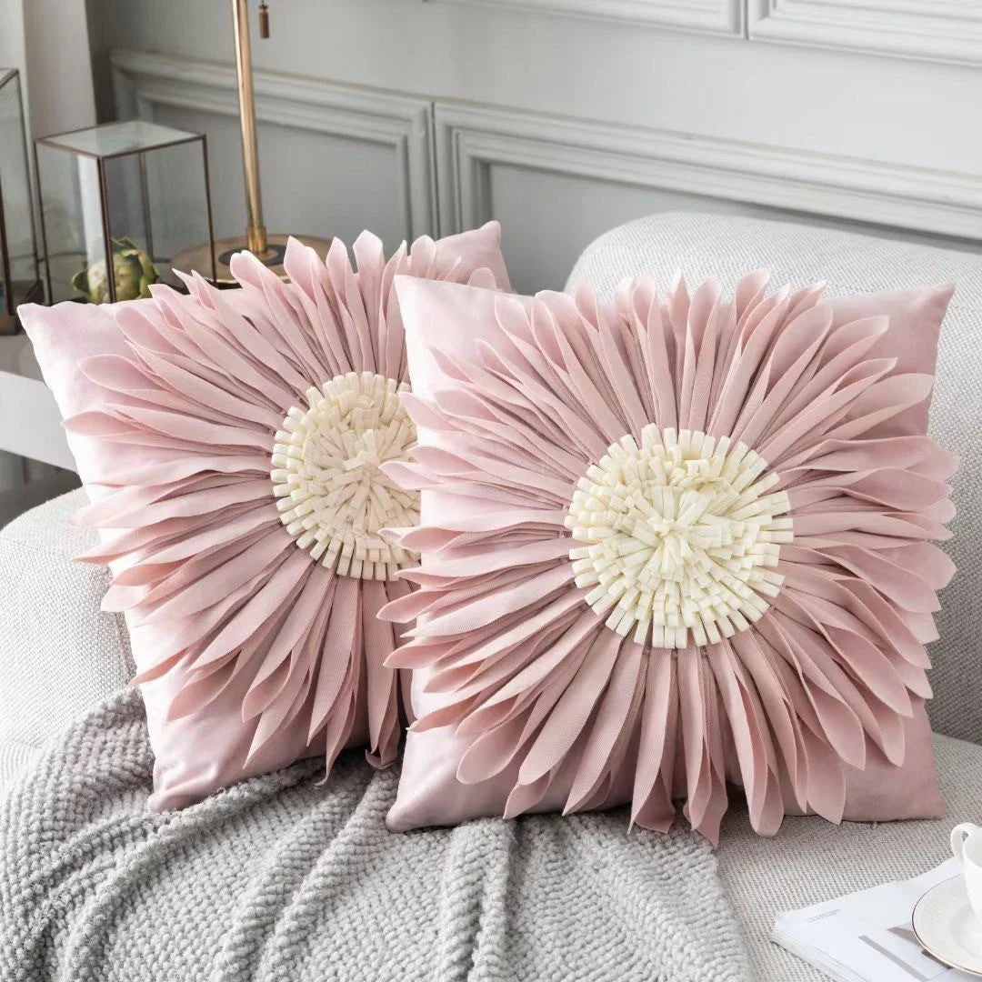 Decorative throw pillows in various colours featuring 3D chrysanthemum embroidery on a velvet surface
