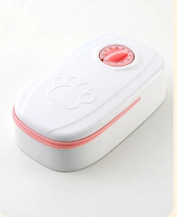 Automatic pet feeder made of durable plastic and stainless steel, designed to dispense consistent meals for cats and dogs without electricity