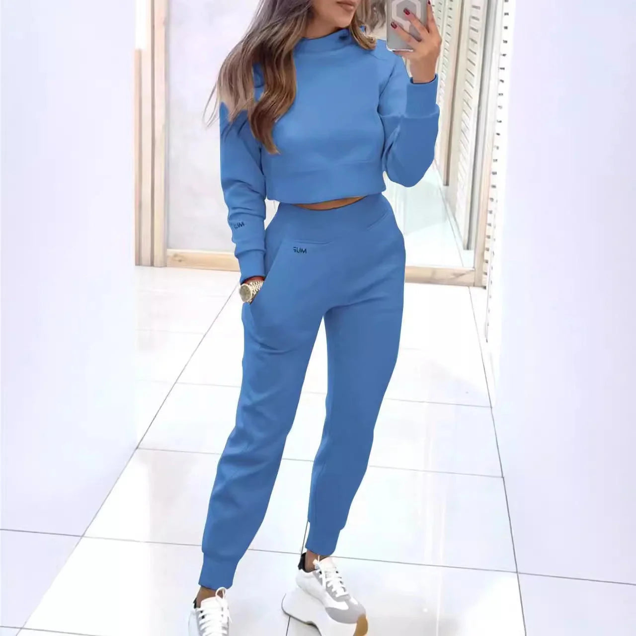 Stylish collared jacket and slim-fit trousers in a variety of colors, perfect for athleisure wear