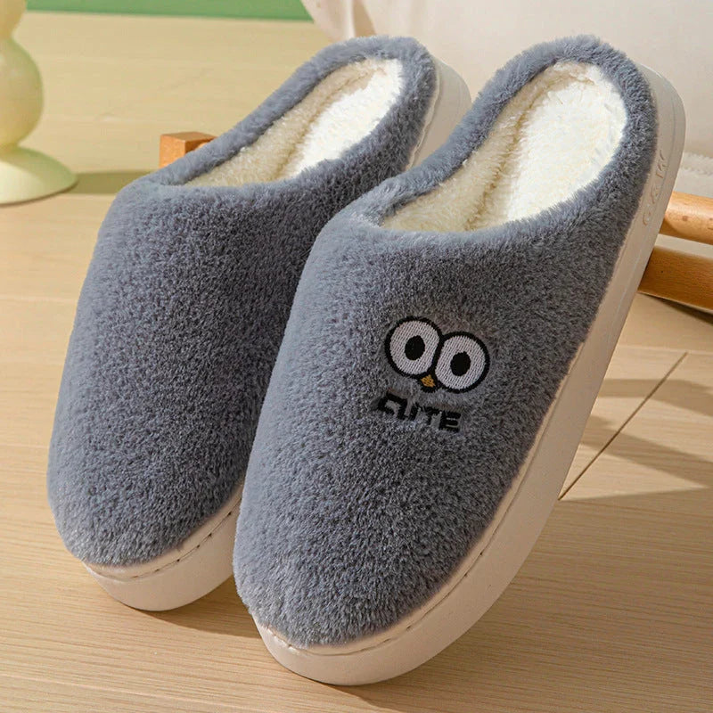 Cozy cartoon-themed slippers for couples, featuring plush material and non-slip rubber soles in a variety of vibrant colors.