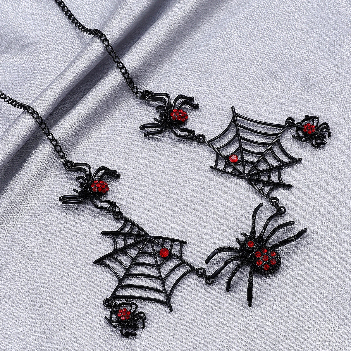 Spooky spider and spider web clavicle necklace, a must-have Halloween fashion accessory with adjustable length and captivating design.