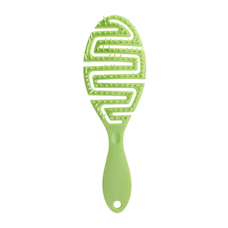 Stylish Massage Comb in various colours offering a soothing scalp massage and modern, minimalist design