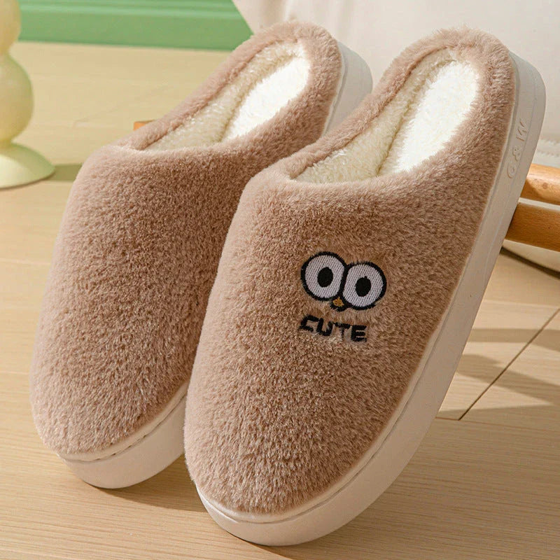Cozy cartoon-themed slippers for couples, featuring plush material and non-slip rubber soles in a variety of vibrant colors.