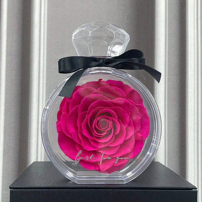 Preserved Rose Flower Ornaments in various colors, including red, pink, plum, and sapphire blue, displayed in a stylish gift box.
