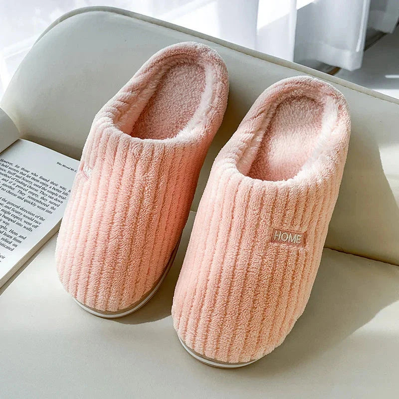 Cozy plush slippers in various colors with non-slip soles for indoor comfort and warmth