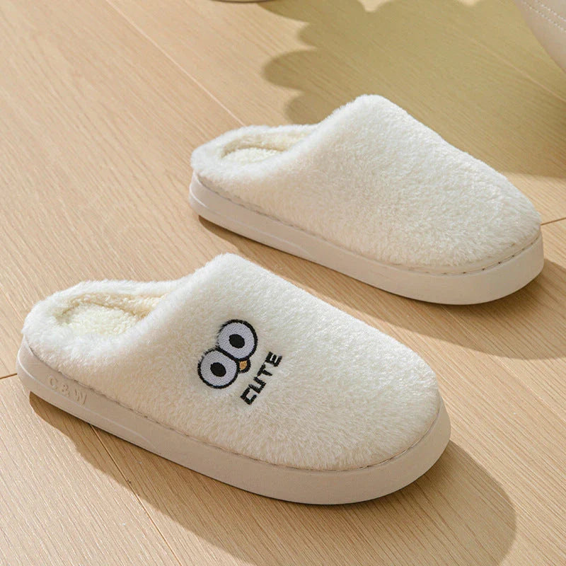 Cozy cartoon-themed slippers for couples, featuring plush material and non-slip rubber soles in a variety of vibrant colors.