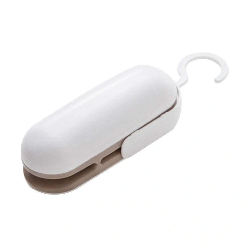 Mini Sealer Portable Heat Sealer in grey and brown for sealing snack bags and plastic packaging