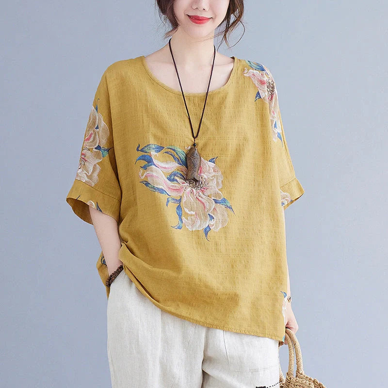 Stylish cotton-blend summer top in yellow and orange colours, featuring a conventional sleeve design and premium natural fabrics