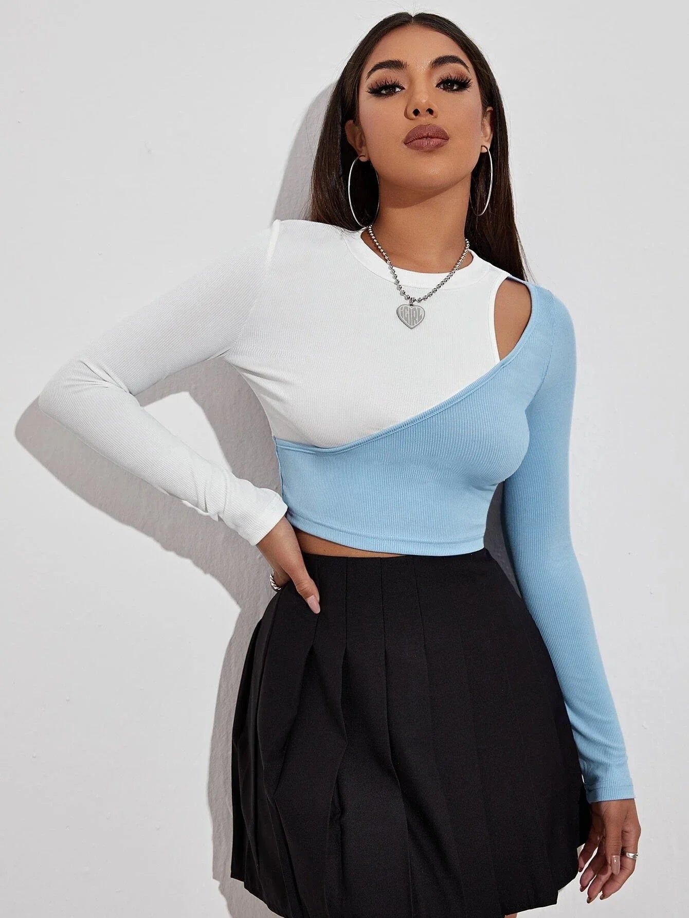 Stylish strapless cropped t-shirt in a trendy colorblock design, perfect for elevating any casual outfit.