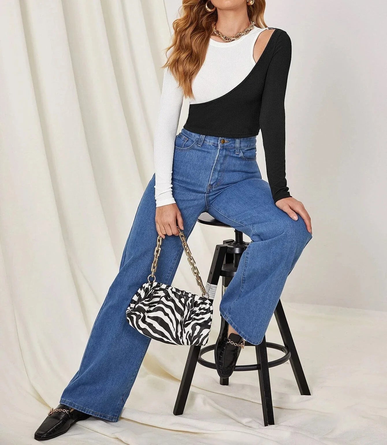 Stylish strapless cropped t-shirt in a trendy colorblock design, perfect for elevating any casual outfit.