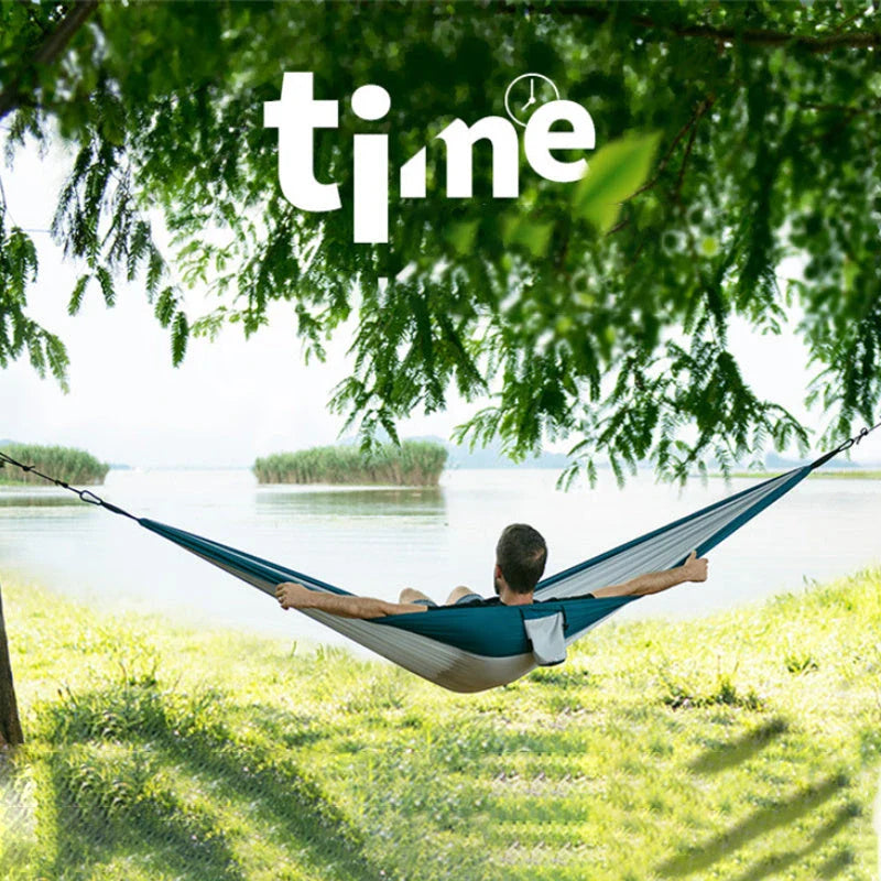 Premium double hammock for outdoor camping and hunting, made with soft, breathable fabric and reinforced climbing ropes