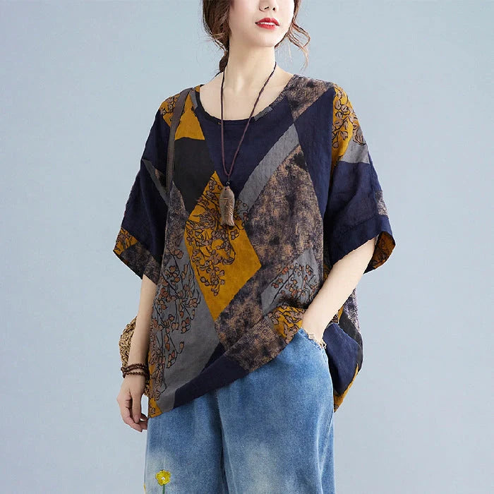 Stylish loose fit women's t-shirt in retro print with vibrant colours of yellow, red, and brown