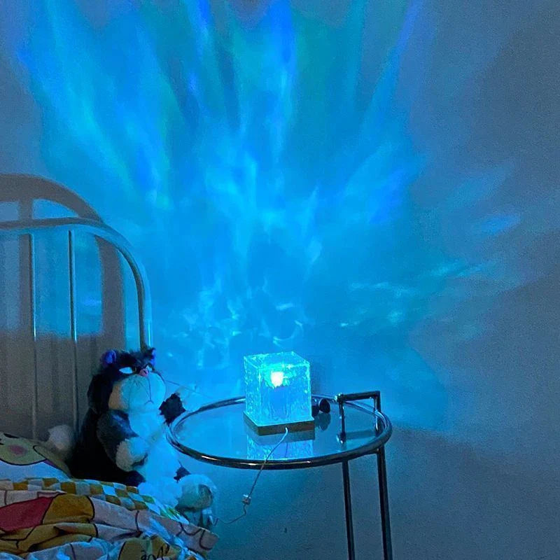 Enchanting water ripple ambient light with 16 color options, remote control, and rotatable design