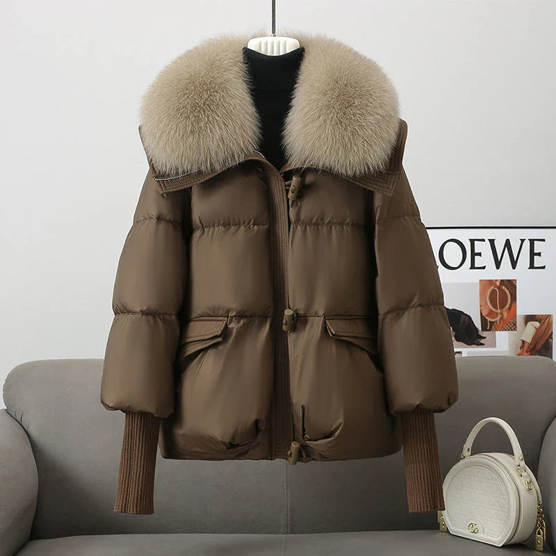Premium down-filled puffer jacket with faux fur collar, available in brown, black, and white colours