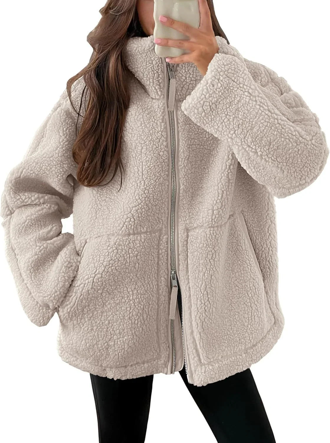 Classic padded fleece jacket in various colours for women, featuring a zip-up design and pockets