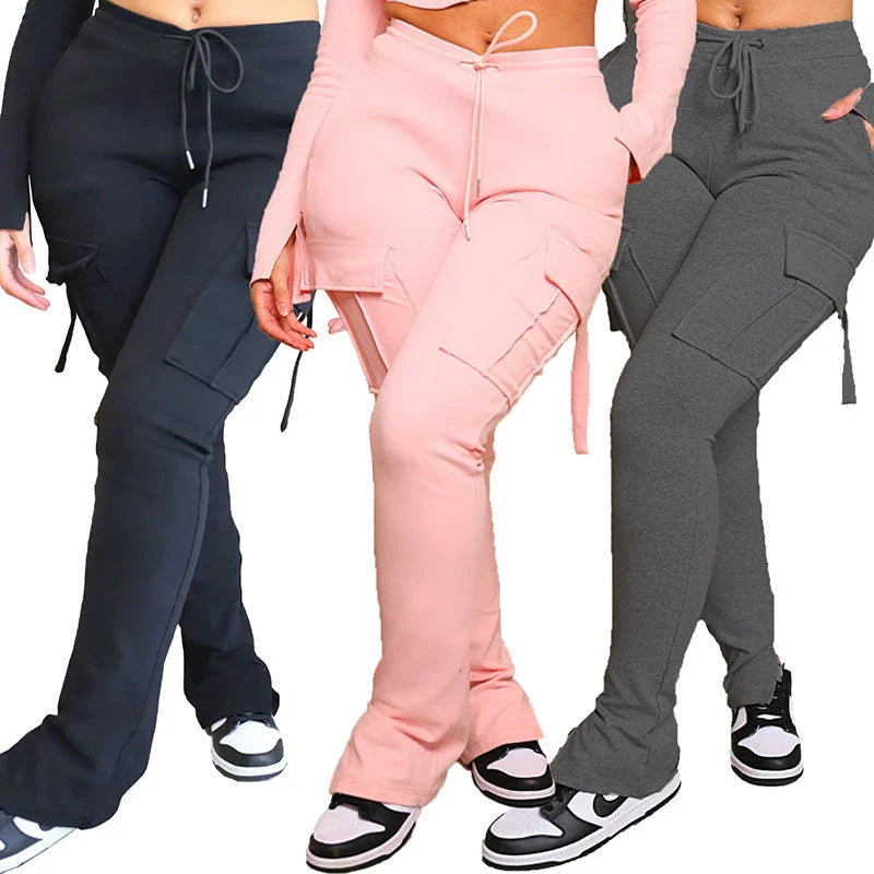 Versatile cargo trousers with pockets, high-waist design, and adjustable drawstring waistband for women