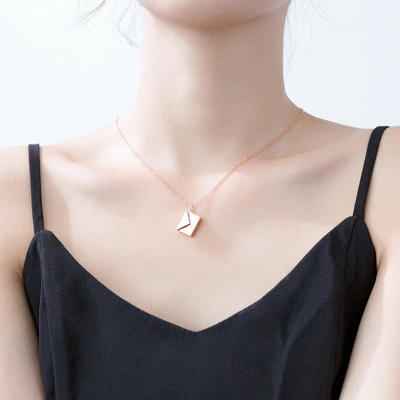 Elegant titanium steel envelope pendant necklace with adjustable chain, versatile for any occasion