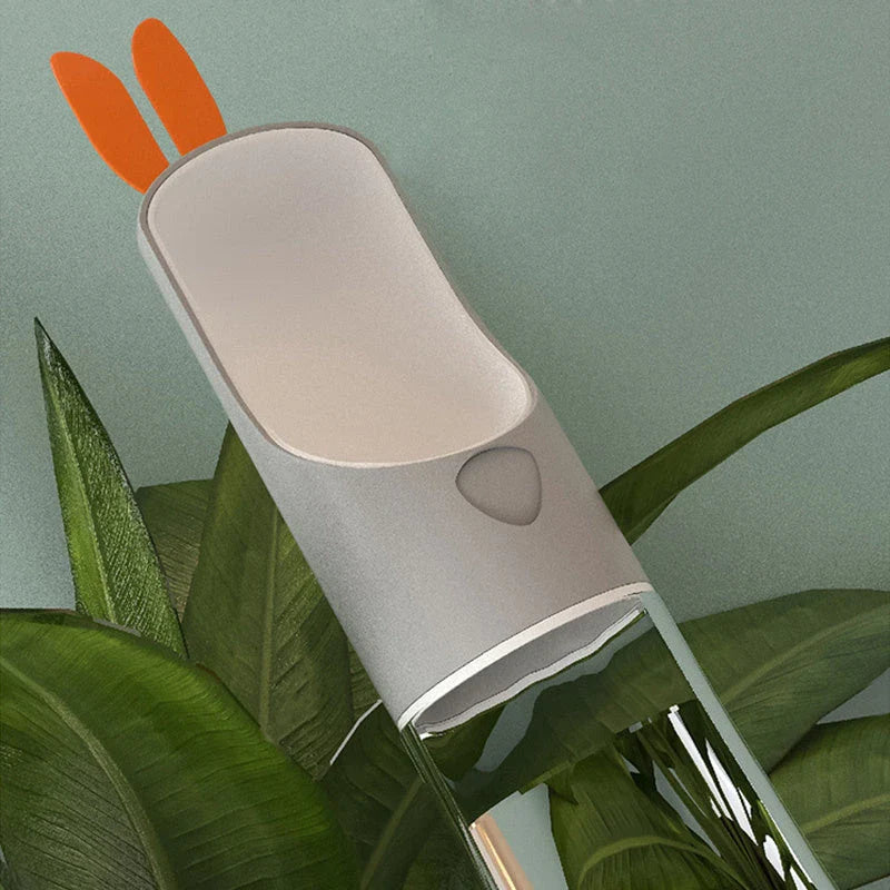 Portable pet water feeder with carbon filter, leak-proof design, and hands-free strap for outdoor hydration