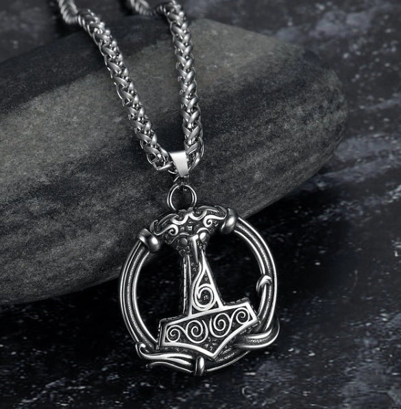 Vintage Norse rune necklaces for men, featuring a range of intricate Viking symbols and designs crafted from premium stainless steel