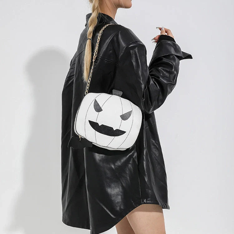 Enchanting Halloween pumpkin-themed shoulder bag in various colours, featuring an adjustable chain strap and trendy urban style