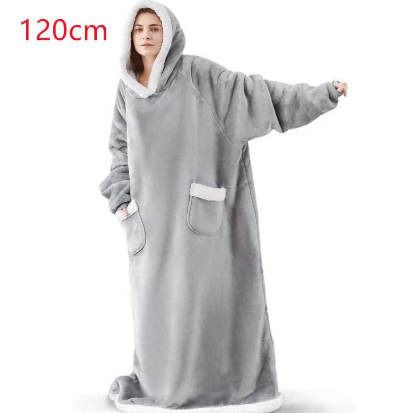 Comfy oversized TV hoodie blanket in various stylish colors, perfect for cozy movie nights and relaxation at home.