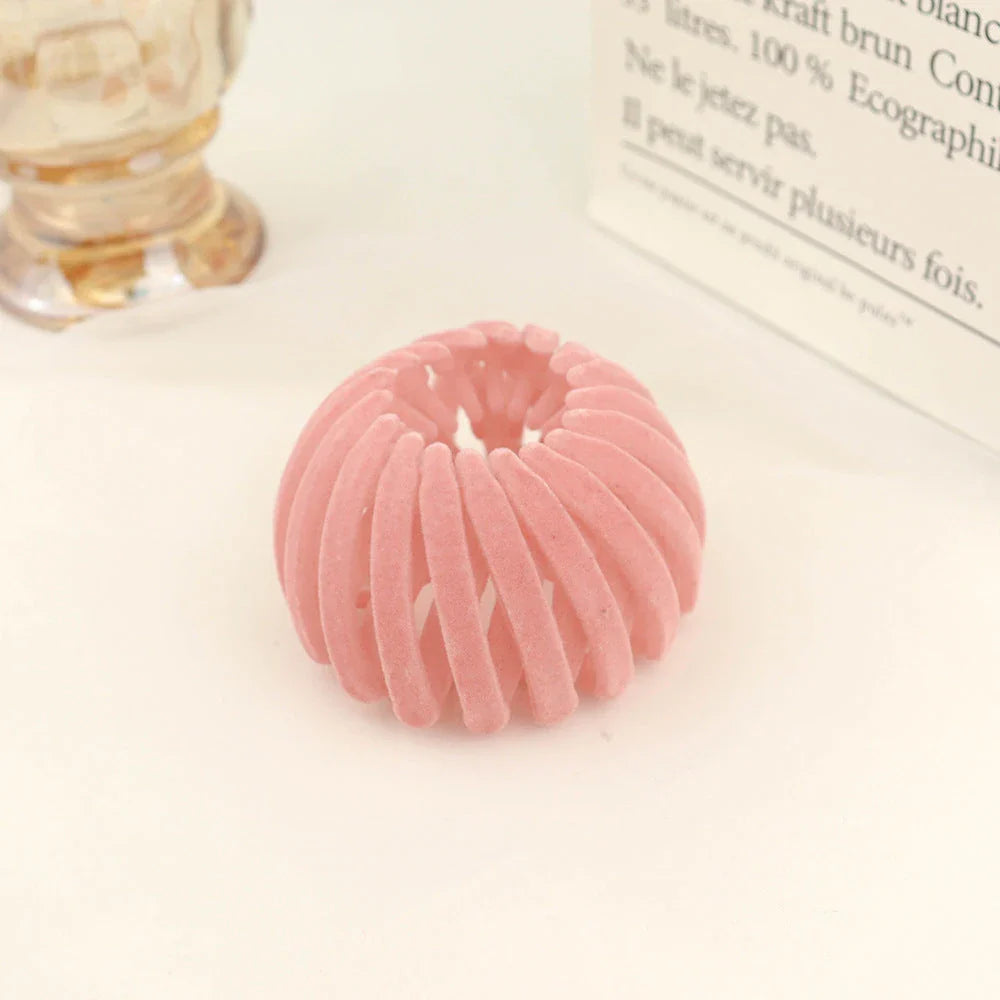 Elegant hair circle accessory with flexible design and teeth for creating stylish ponytails