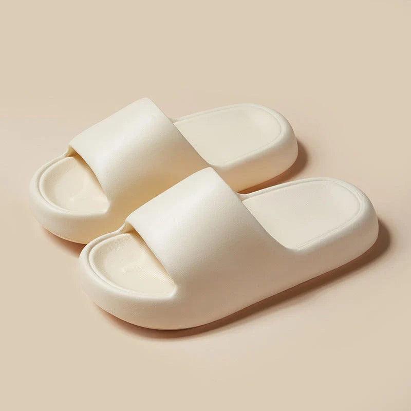 Comfortable EVA foam slip-on slippers in various colors, featuring non-slip soles and a breathable design for indoor and bathroom use.
