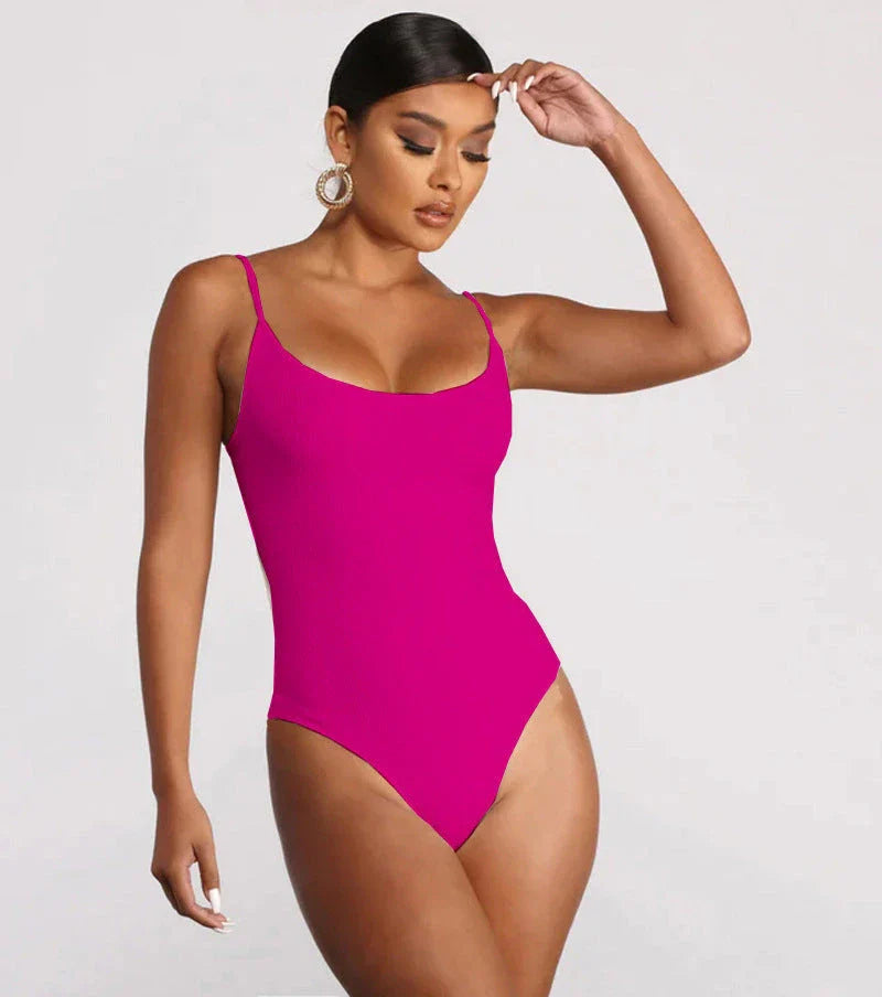 Stylish backless one-piece swimsuit in various vibrant colors for curvy women