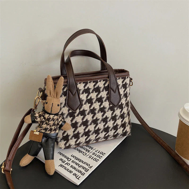 Stylish houndstooth shoulder bags in various colors, including black, coffee, and brown, with and without pendants, featuring a portable and versatile design for everyday use.