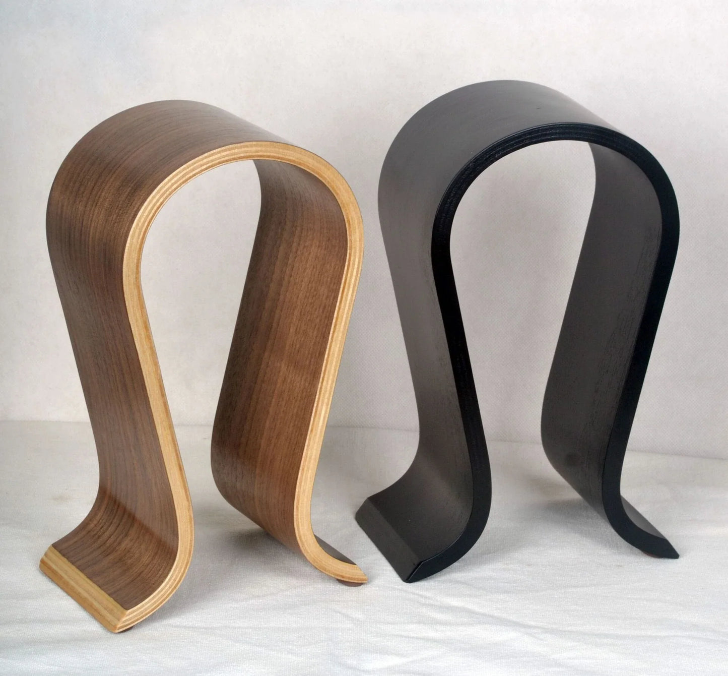 Elegant solid wood headphone stand in a contemporary design for beautiful display of audio equipment