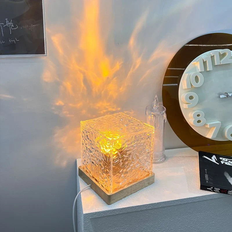 Enchanting water ripple ambient light with 16 color options, remote control, and rotatable design