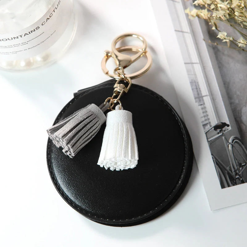 Mini round PU leather small mirror with lovely tassel in various colours