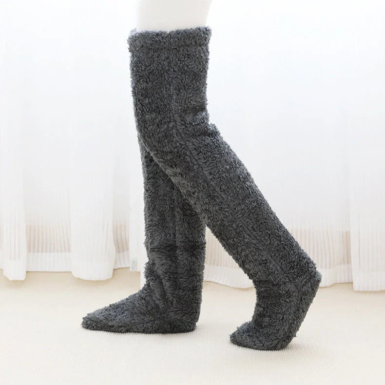 Cozy over-the-knee fuzzy socks in various colors, including brown, blue, dark gray, and pink purple