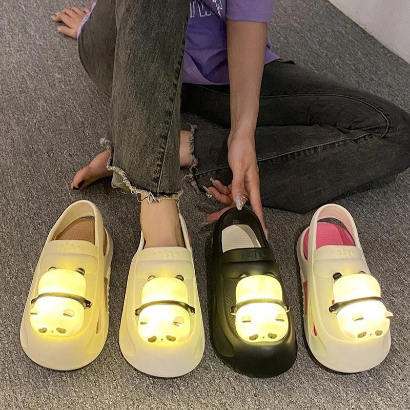 Adorable panda-themed slip-on slippers in various colors and sizes, featuring a lightweight and breathable design for comfortable everyday wear.