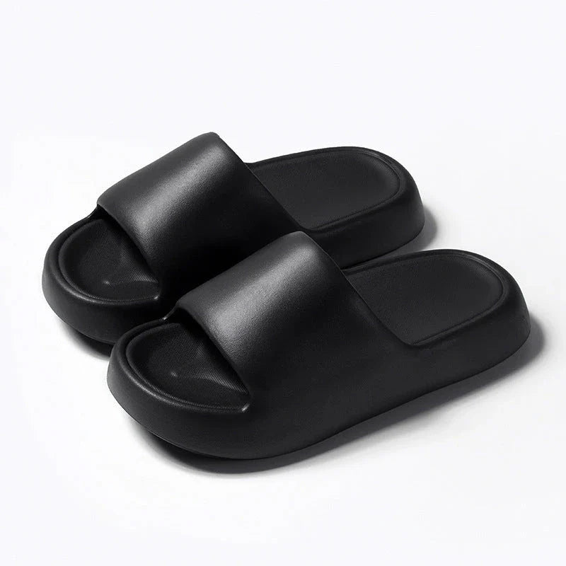 Comfortable EVA foam slip-on slippers in various colors, featuring non-slip soles and a breathable design for indoor and bathroom use.