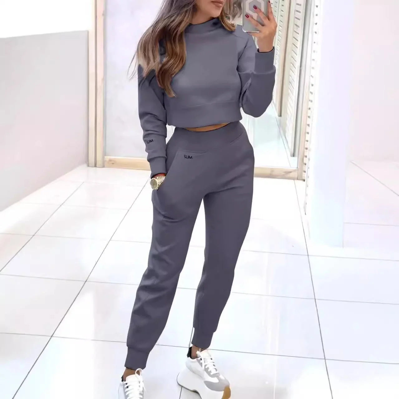 Stylish collared jacket and slim-fit trousers in a variety of colors, perfect for athleisure wear
