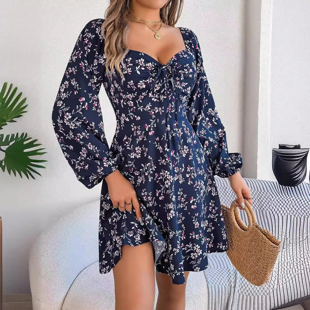 Stunning floral dress with trendy lantern sleeves, featuring a chic A-line silhouette and vibrant color options