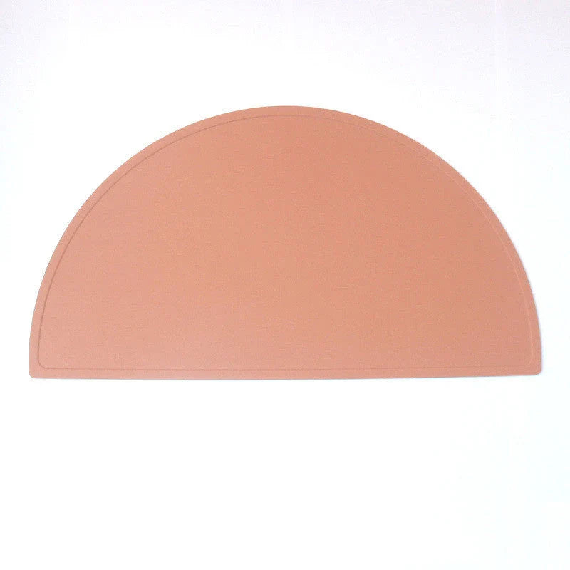 Durable silicone placemat in various colors, featuring waterproof and stain-resistant properties for easy cleaning
