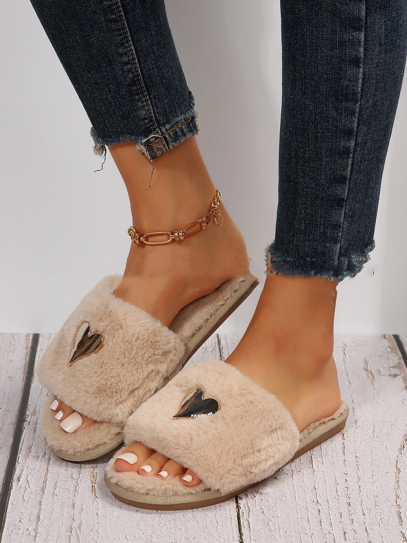 Cosy faux fur slippers in various colours for comfortable indoor wear