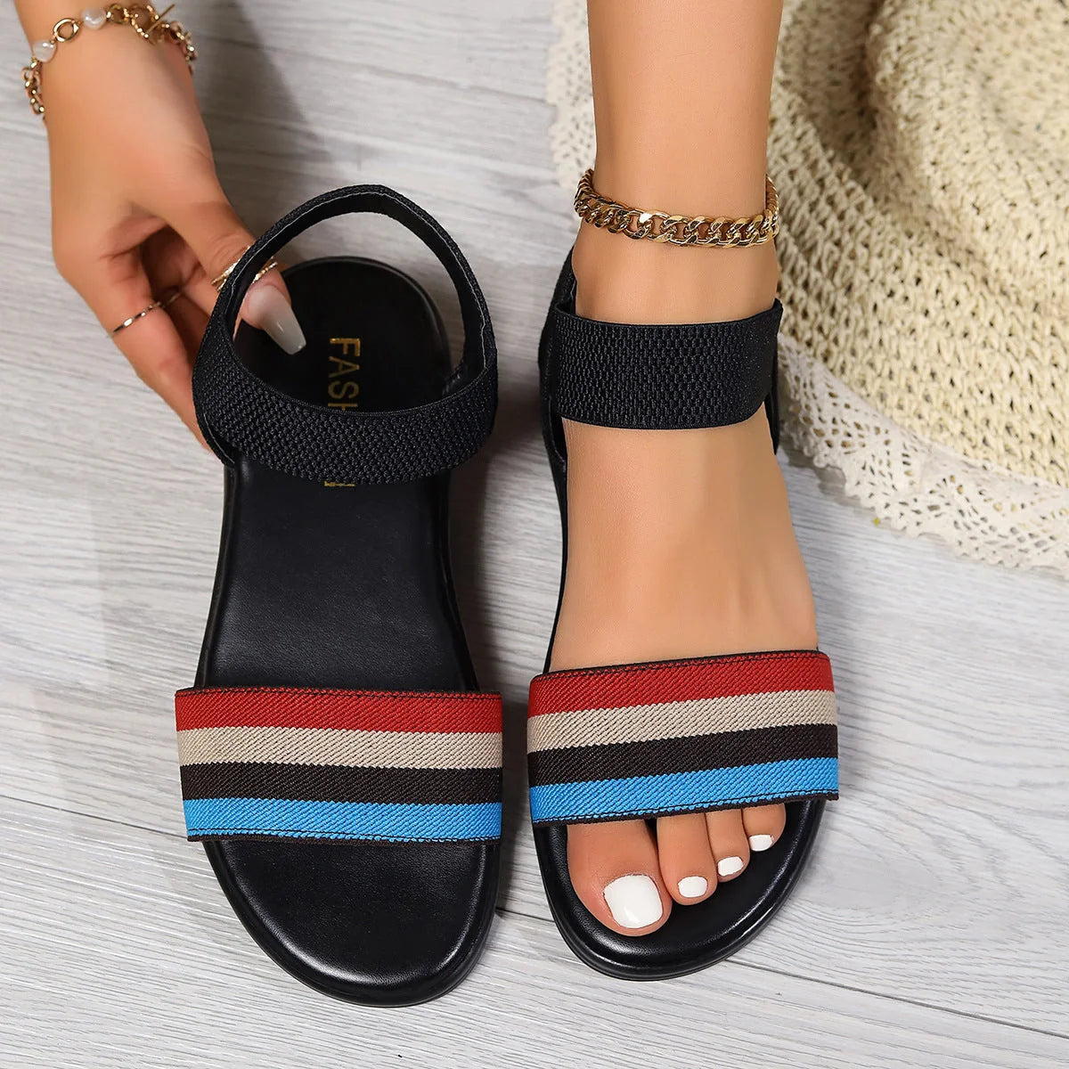 Stylish colour-block elastic sandals with fish-mouth design, featuring a variety of vibrant hues and comfortable rubber soles.