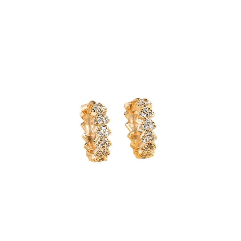 Premium copper-plated gold and zircon stud earrings in a classic design, exuding British elegance and sophistication