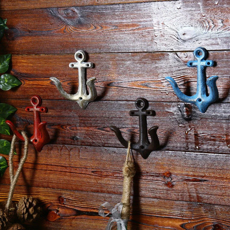 Industrial-style wrought iron wall hook with multiple rows for hanging coats and bags