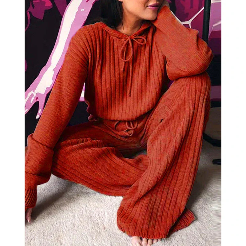 Cozy hooded two-piece loungewear set with soft, stretchy fabric and relaxed silhouette
