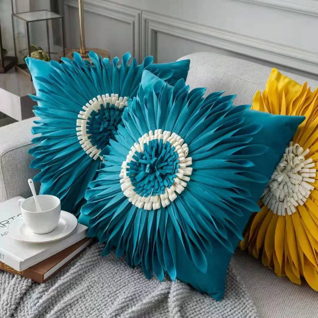 Decorative throw pillows in various colours featuring 3D chrysanthemum embroidery on a velvet surface