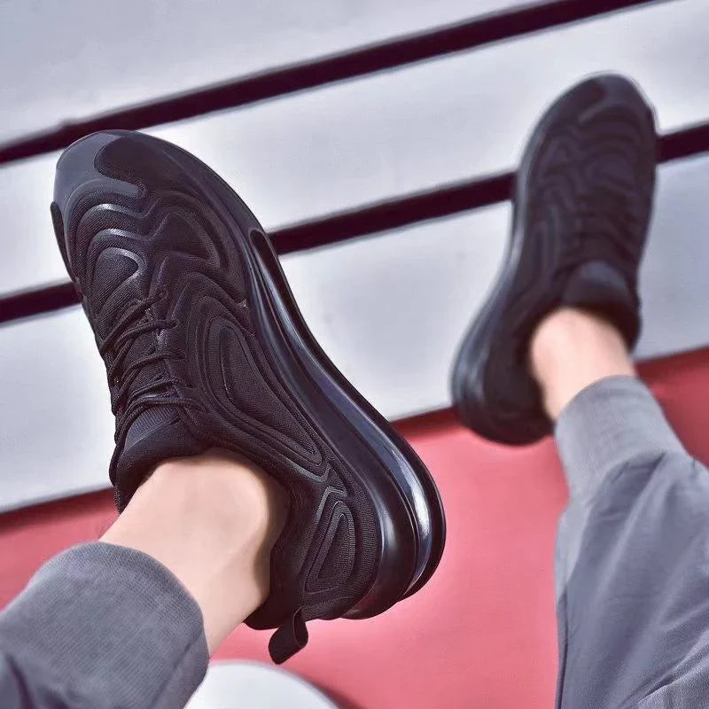 Comfortable black and red air cushion sneakers with lace-up closure for active men